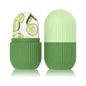 Green ribbed ice roller for face and eye massage, product shot on white background