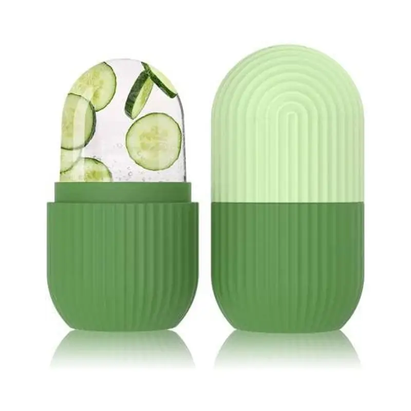 Green ribbed ice roller for face and eye massage, product shot on white background