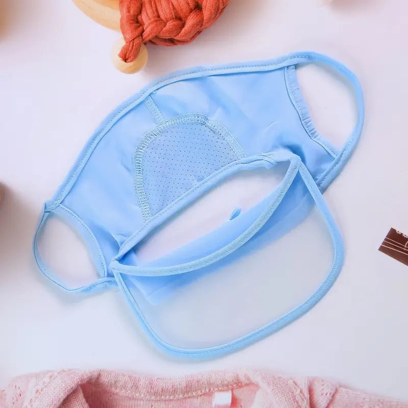 Blue UV protection cap laid flat, showing the full visor and face panel