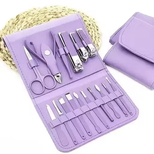 Purple manicure kit open, showing clippers, scissors, nippers, files and picks in their slots
