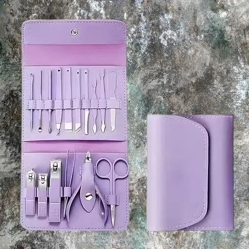 16-piece purple manicure kit open and closed, shown on a stone background