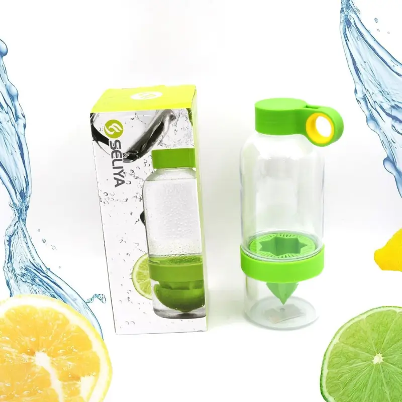 Bottle next to its retail packaging box, with water splash and citrus fruit graphics
