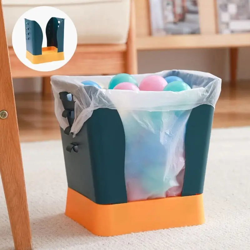 Trash bag frame holding a full garbage bag with toy balls inside, on an orange base
