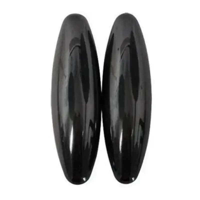 Close-up of two black oval magnetic pieces side by side